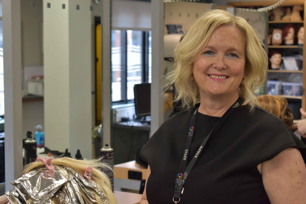 Hairdressing teacher hoping to cut the mustard after being named finalist in national competition