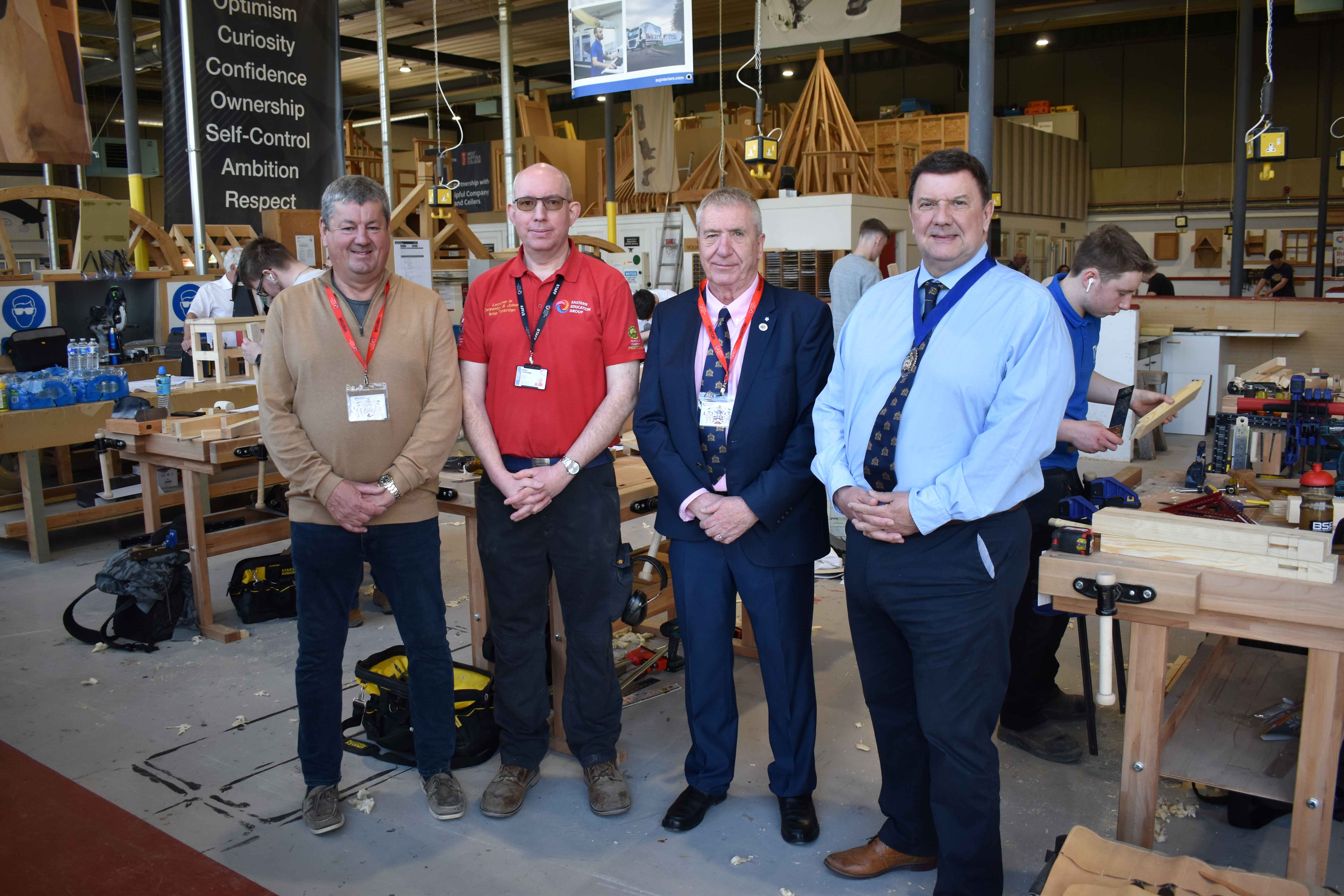 1 Adam Hobbs independent judge Brian Tunbridge from West Suffolk College with Peter Maton and Gareth Watkins from The Worshipful Company of Joiners and Ceilers
