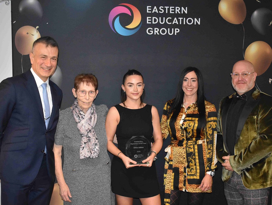 Dr Nikos Savvas with Chloe Gilbert (Centre) with her nan to her left and mum to her right with Phil Stittle - Dr Savvas and Mr Stittle are from the Eastern Education Group