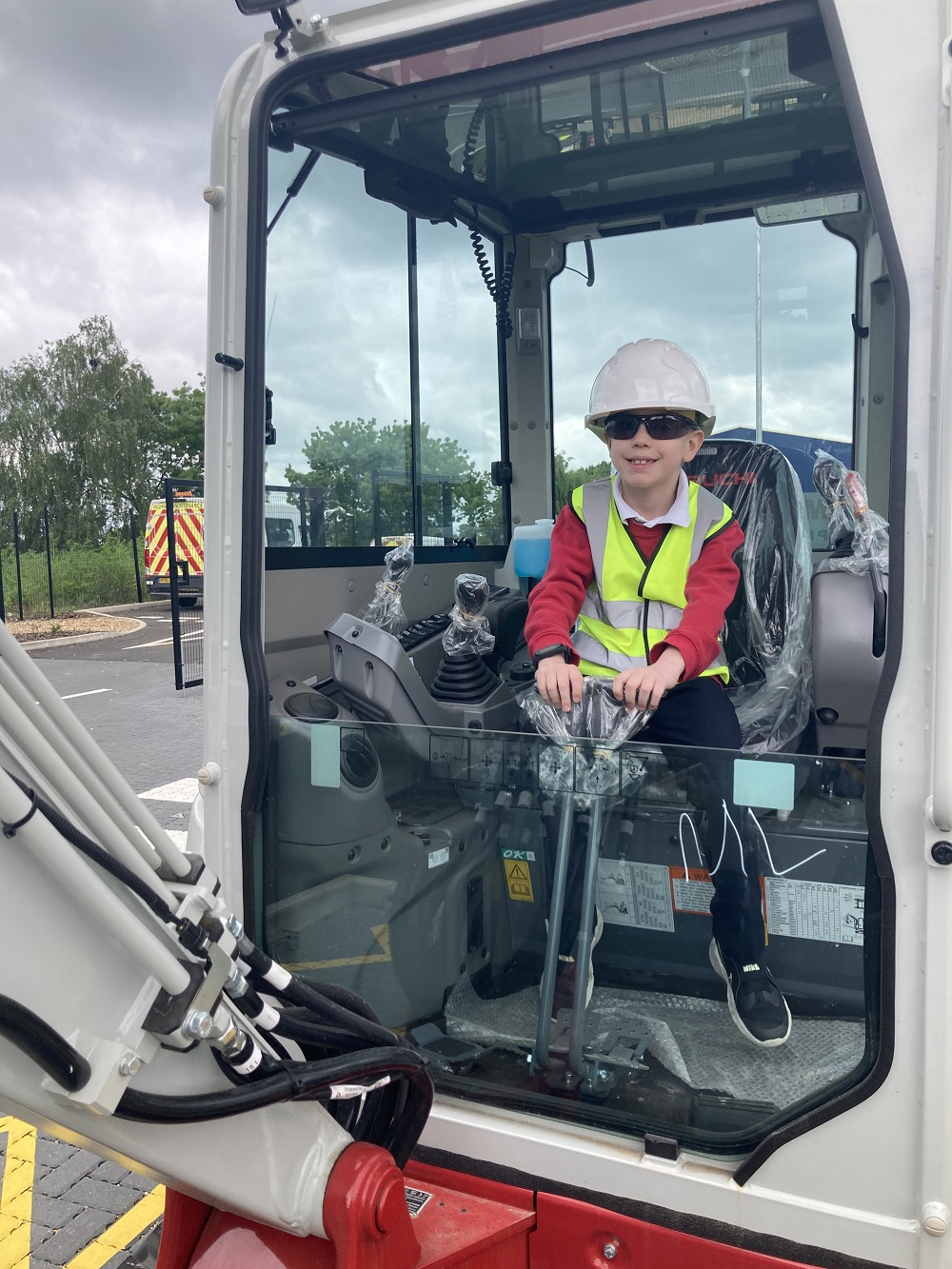 Pupil on a digger