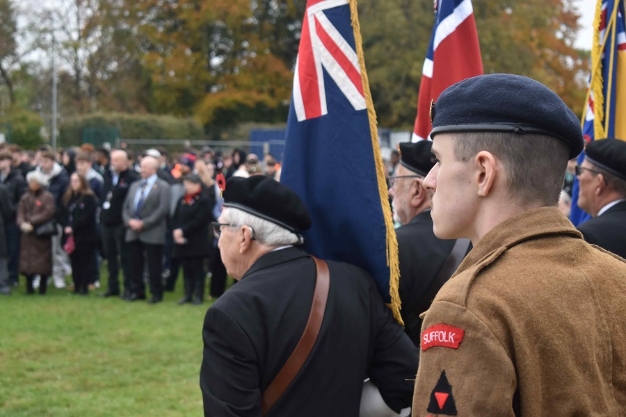 2 Rion Lewis in the foreground falls silent to remember Rion helped created the D Day mural and cenotaph