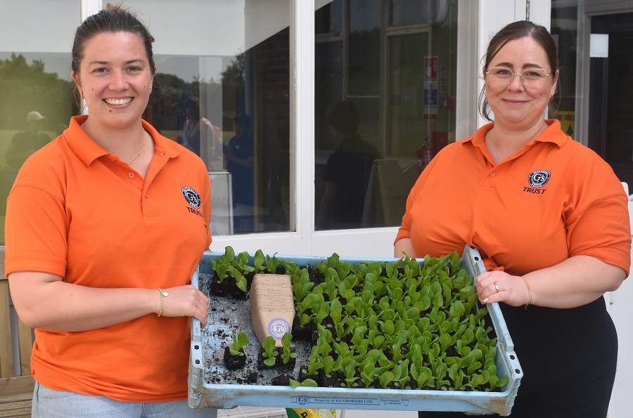 5 Chloe Mitchell and Rebecca Foster from G's Fresh taught youngsters how to plant lettuces