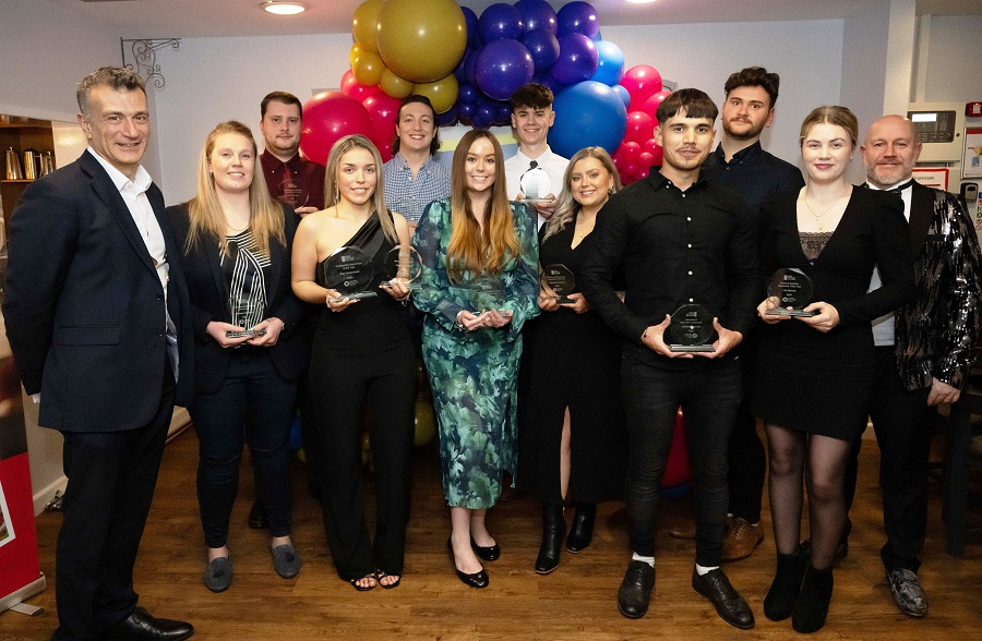 8 group shot of most of the winners with dr Nikos Savvas left and Phil Stittle master of ceremonies right