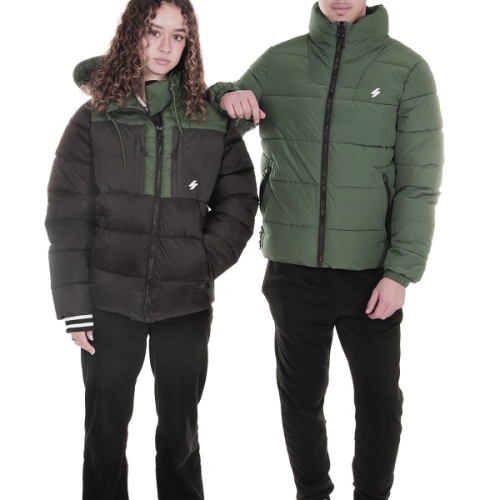 photo of two people with thick jackets one fully green and the other green and black