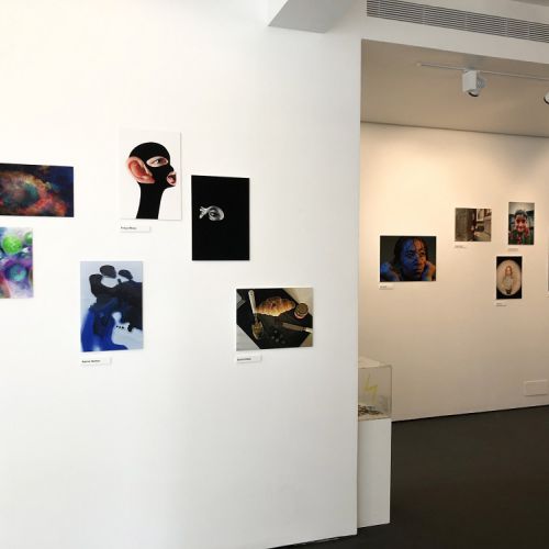 Photo of two walls with Photos on