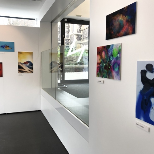Photo of two walls with Photos on