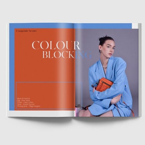 book opened to a page, titled "colour blocking" right side is a person with a big blue jacket